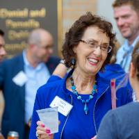 Guests talking to each other at the event.